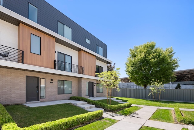 507 W 620 N Unit 127, Centerville, UT 84014 - back of property featuring a balcony, a patio, and brick siding