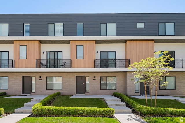 507 W 620 N Unit 127, Centerville, UT 84014 - view of front facade featuring stucco siding and brick siding