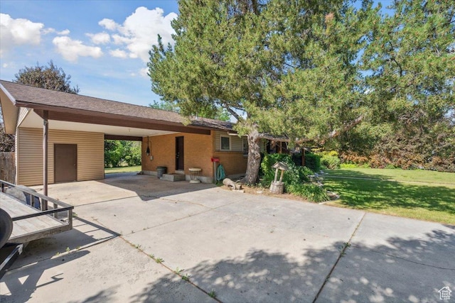 666 E Shelly Ave N, American Fork, UT 84003 - view of patio / terrace with driveway and an attached carport