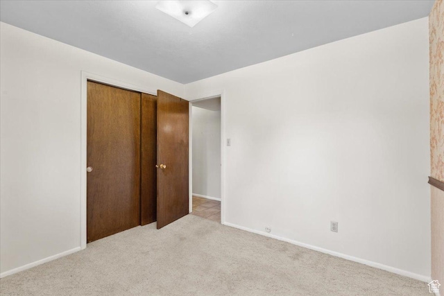 666 E Shelly Ave N, American Fork, UT 84003 - unfurnished bedroom featuring carpet floors and a closet