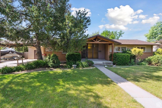 666 E Shelly Ave N, American Fork, UT 84003 - view of front of house with a front lawn and brick siding