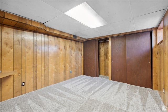 666 E Shelly Ave N, American Fork, UT 84003 - unfurnished bedroom with carpet, wood walls, and a paneled ceiling