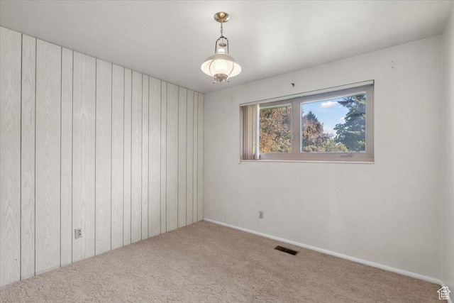 666 E Shelly Ave N, American Fork, UT 84003 - carpeted empty room featuring wood walls