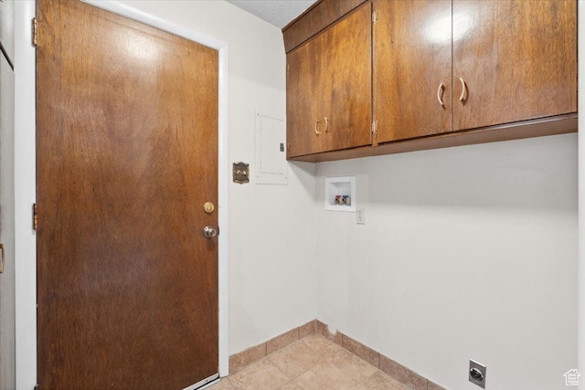 666 E Shelly Ave N, American Fork, UT 84003 - laundry room with cabinet space, electric dryer hookup, washer hookup, and light tile patterned floors