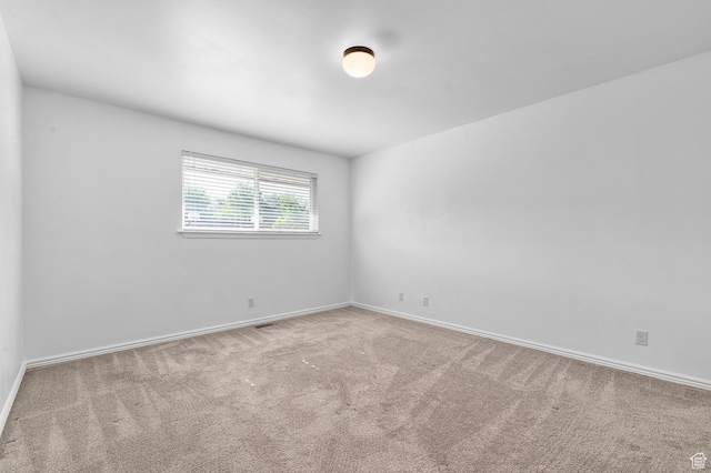 314 W Center St Unit 123, Bountiful, UT 84010 - carpeted spare room featuring baseboards
