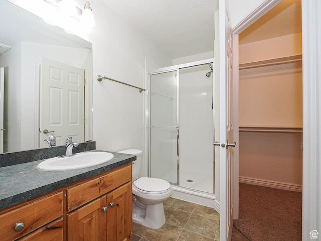 478 W 470 S, Provo, UT 84601 - bathroom with a spacious closet, a shower stall, and vanity