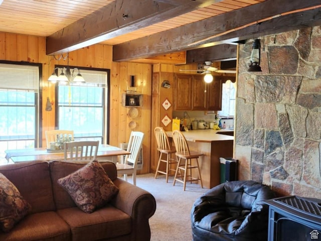 11829 Falcon Pt Unit H21, Huntsville, UT 84317 - living room with a wood ceiling with exposed beams, carpet floors, and wood walls