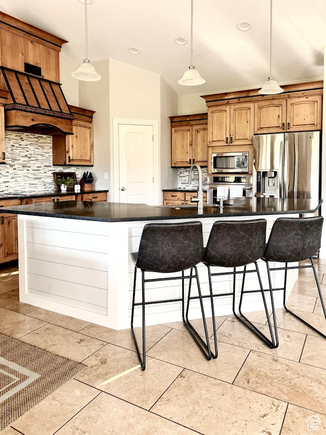 1790 S 940 W, Richfield, UT 84701 - kitchen featuring stainless steel appliances, extractor fan, dark countertops, decorative backsplash, and recessed lighting