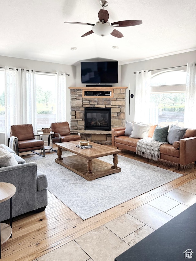 1790 S 940 W, Richfield, UT 84701 - living room featuring a ceiling fan, wood-type flooring, and a fireplace