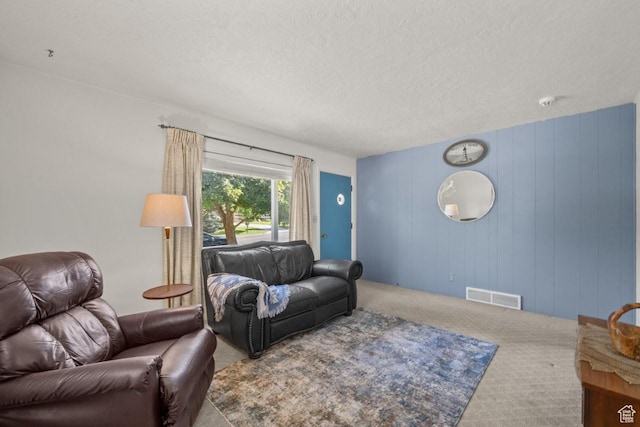 1243 Oak St, Ogden, UT 84401 - carpeted living area featuring a textured ceiling