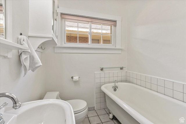 1351 E Browning Ave S, Salt Lake City, UT 84105 - bathroom featuring a freestanding bath and tile patterned floors