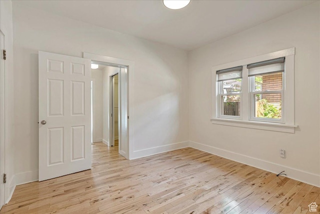 1351 E Browning Ave S, Salt Lake City, UT 84105 - empty room featuring light wood finished floors and baseboards