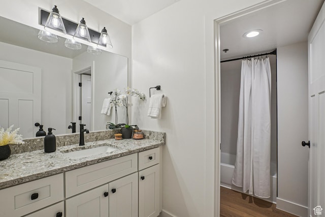 2174 Fenchurch Dr, Park City, UT 84060 - full bath with vanity, wood finished floors, and shower / bath combo