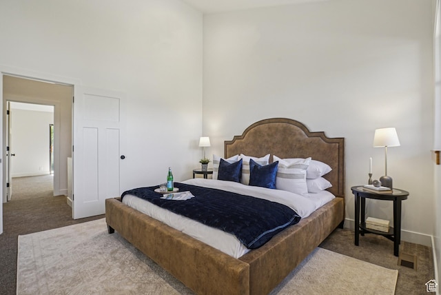 2174 Fenchurch Dr, Park City, UT 84060 - carpeted bedroom featuring a high ceiling and baseboards