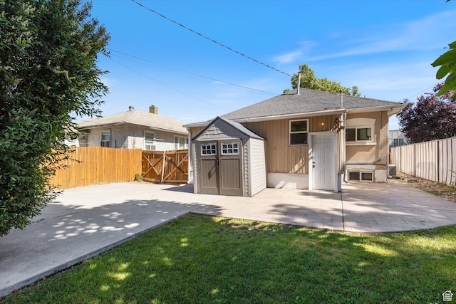 754 E 500 S, Provo, UT 84606 - rear view of property with a patio, a fenced backyard, and a storage unit