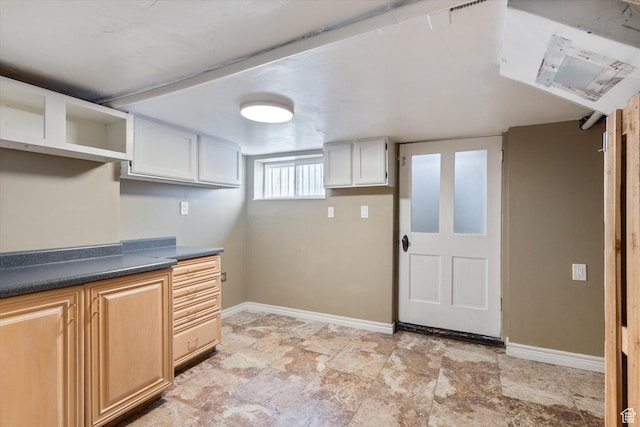 754 E 500 S, Provo, UT 84606 - kitchen featuring dark countertops, open shelves, and light stone finish flooring