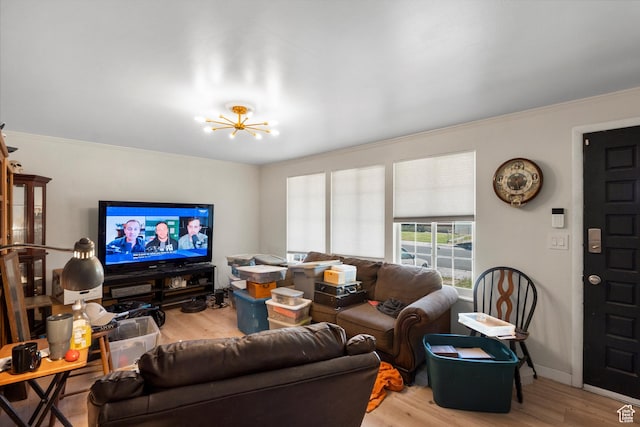 8168 S Darin St, Midvale, UT 84047 - living area with wood finished floors, a chandelier, and ornamental molding