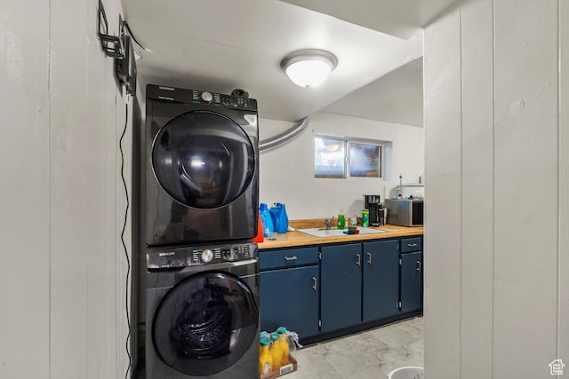 8168 S Darin St, Midvale, UT 84047 - laundry area with estacked washer and dryer and a sink