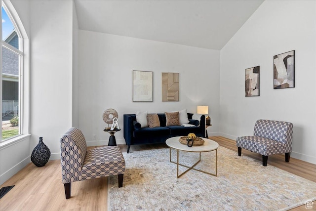 692 E Country Breeze Cir S, Draper, UT 84020 - living area with wood finished floors and vaulted ceiling