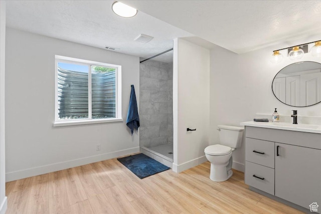 692 E Country Breeze Cir S, Draper, UT 84020 - full bath featuring vanity, wood finished floors, and a tile shower