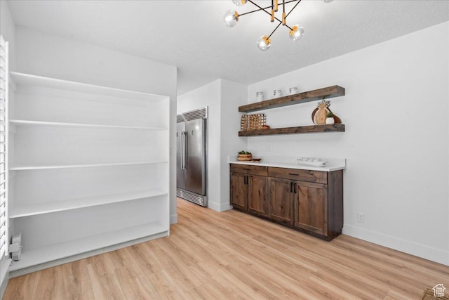 692 E Country Breeze Cir S, Draper, UT 84020 - unfurnished dining area with light wood-style floors and a chandelier