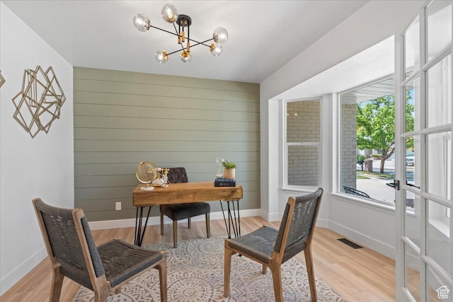 692 E Country Breeze Cir S, Draper, UT 84020 - home office with a chandelier, light wood-style flooring, and wood walls