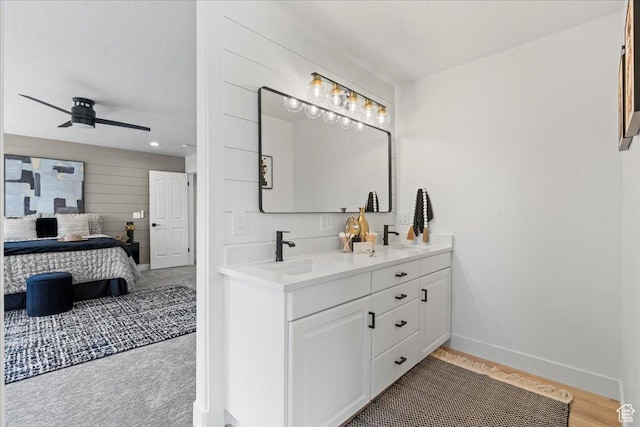 692 E Country Breeze Cir S, Draper, UT 84020 - ensuite bathroom featuring double vanity, ceiling fan, and wood finished floors