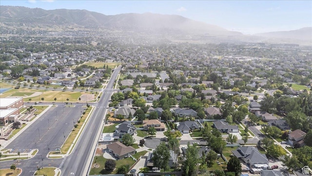 692 E Country Breeze Cir S, Draper, UT 84020 - aerial view of property and surrounding area with a mountainous background and nearby suburban area