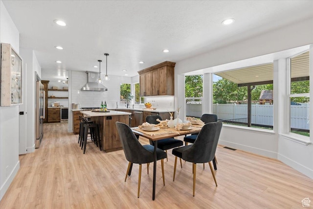 692 E Country Breeze Cir S, Draper, UT 84020 - dining space featuring light wood-type flooring, healthy amount of natural light, and recessed lighting