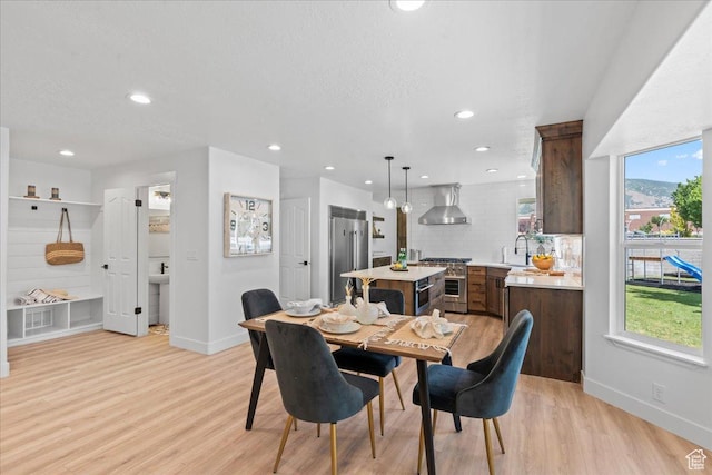 692 E Country Breeze Cir S, Draper, UT 84020 - dining space featuring light wood-style floors and recessed lighting
