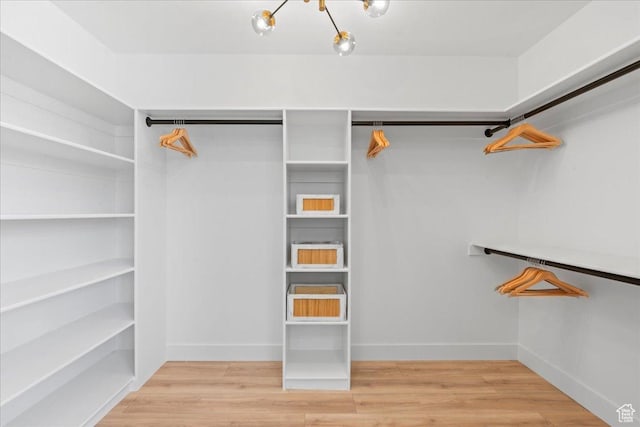 692 E Country Breeze Cir S, Draper, UT 84020 - spacious closet featuring wood finished floors