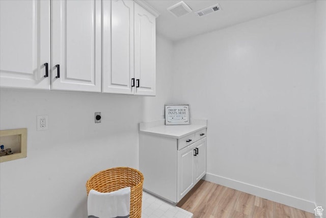 692 E Country Breeze Cir S, Draper, UT 84020 - washroom featuring cabinet space, hookup for an electric dryer, hookup for a washing machine, and light wood-style floors