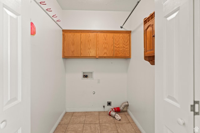 890 E Monroe Canyon Rd S, Monroe, UT 84754 - washroom featuring cabinet space, hookup for a washing machine, electric dryer hookup, gas dryer hookup, and light tile patterned floors