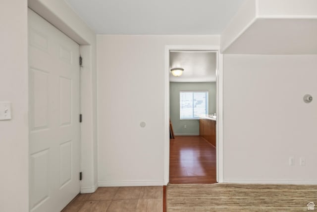 890 E Monroe Canyon Rd S, Monroe, UT 84754 - hallway with baseboards and light tile patterned floors