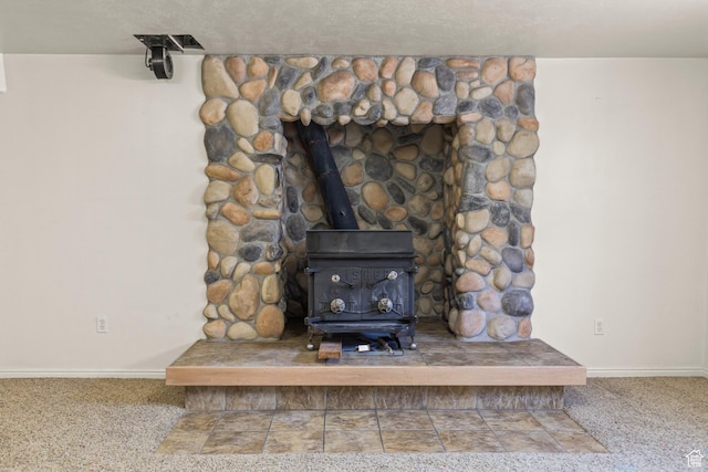 890 E Monroe Canyon Rd S, Monroe, UT 84754 - detailed view of a wood stove and carpet flooring