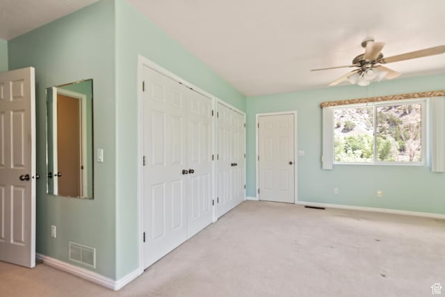 890 E Monroe Canyon Rd S, Monroe, UT 84754 - unfurnished bedroom featuring multiple closets and carpet floors