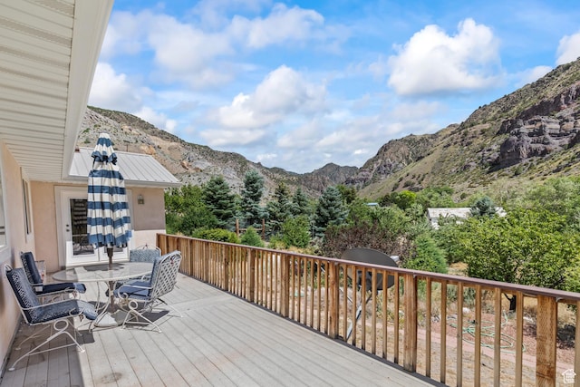890 E Monroe Canyon Rd S, Monroe, UT 84754 - wooden terrace featuring a mountain view and outdoor dining space