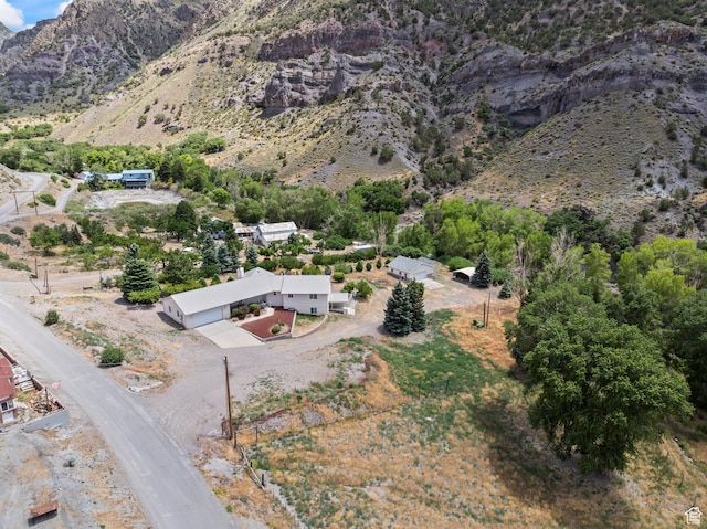 890 E Monroe Canyon Rd S, Monroe, UT 84754 - aerial overview of property's location with a mountainous background