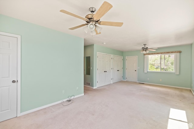 890 E Monroe Canyon Rd S, Monroe, UT 84754 - unfurnished bedroom with multiple closets, carpet floors, electric panel, and ceiling fan