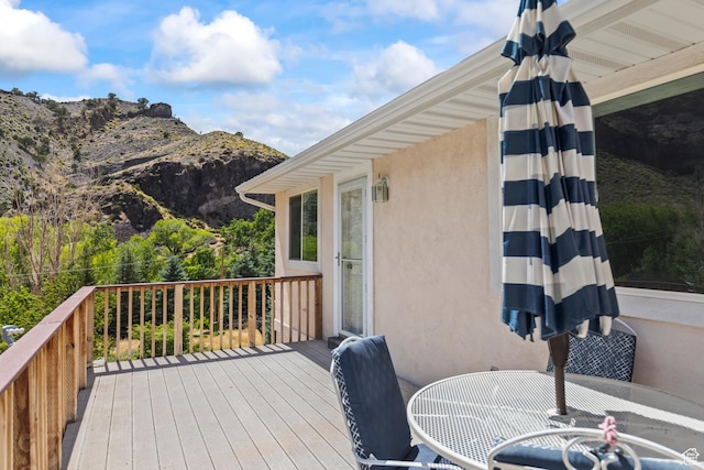 890 E Monroe Canyon Rd S, Monroe, UT 84754 - wooden deck with outdoor dining space and a mountain view