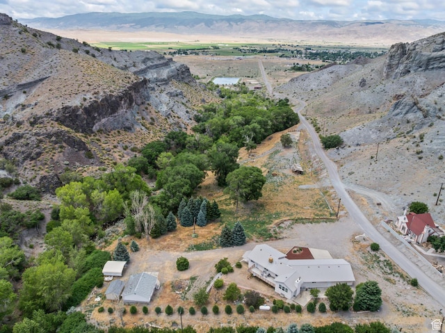 890 E Monroe Canyon Rd S, Monroe, UT 84754 - aerial overview of property's location featuring a mountainous background and rural landscape