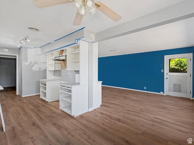 1815 E Hillcrest Ave, Salt Lake City, UT 84106 - unfurnished living room with wood finished floors and ceiling fan