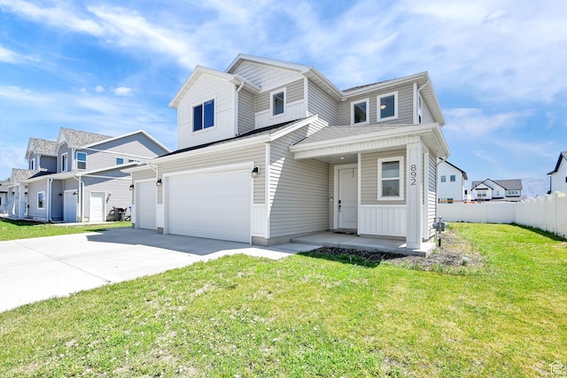 892 N 900 W, Tremonton, UT 84337 - multi unit property featuring concrete driveway, an attached garage, and a porch