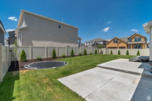 10948 S Samoa Dune Dr Unit 1027, South Jordan, UT 84009 - fenced backyard featuring a trampoline, a patio, and a residential view