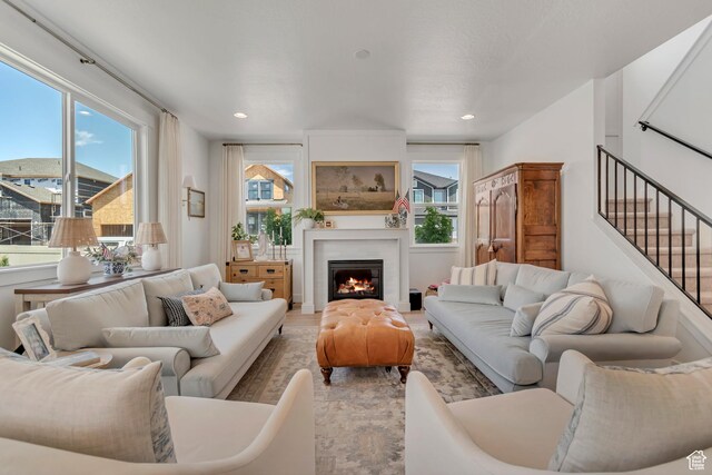 10948 S Samoa Dune Dr Unit 1027, South Jordan, UT 84009 - living area with a large fireplace, stairway, recessed lighting, and light wood-style floors