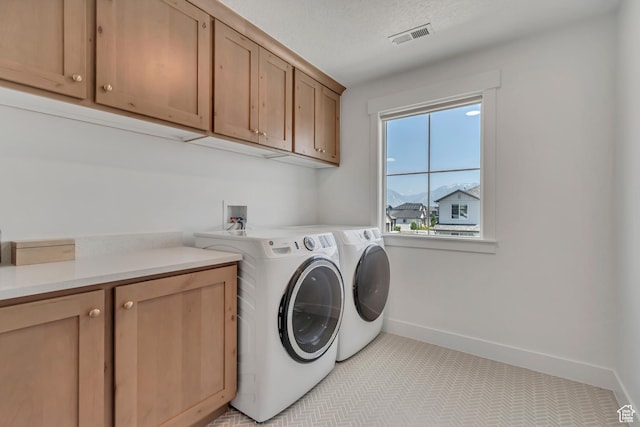 10948 S Samoa Dune Dr Unit 1027, South Jordan, UT 84009 - laundry area featuring cabinet space and washer and dryer