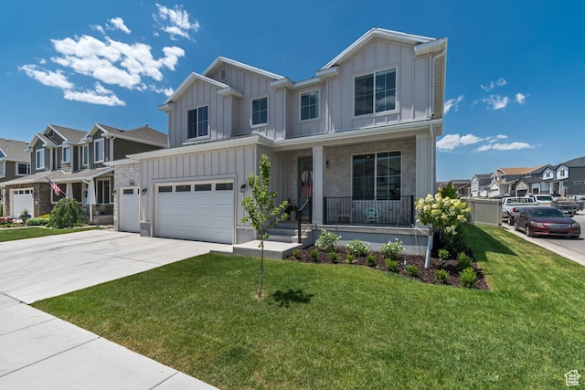 10948 S Samoa Dune Dr Unit 1027, South Jordan, UT 84009 - view of front of property with board and batten siding, a porch, a residential view, an attached garage, and concrete driveway