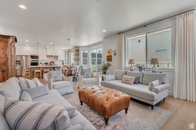 10948 S Samoa Dune Dr Unit 1027, South Jordan, UT 84009 - living area with a chandelier, light wood finished floors, and recessed lighting