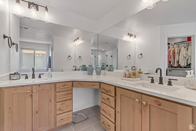 10948 S Samoa Dune Dr Unit 1027, South Jordan, UT 84009 - full bath featuring tile patterned floors, double vanity, and a walk in closet