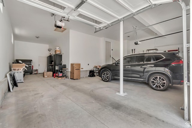 10948 S Samoa Dune Dr Unit 1027, South Jordan, UT 84009 - garage with a garage door opener
